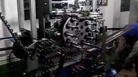 自動絲網印刷機采用SMC氣動機械手完成自動取料